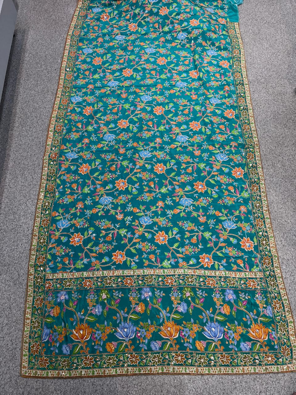 Premium Teal Blue Floral Soft Silk Saree with All-Over Botanical Weaving & Elegant Designer Border