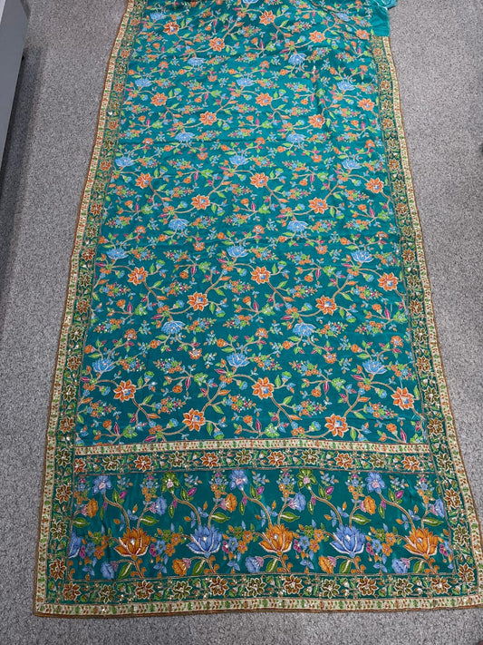 Premium Teal Blue Floral Soft Silk Saree with All-Over Botanical Weaving & Elegant Designer Border